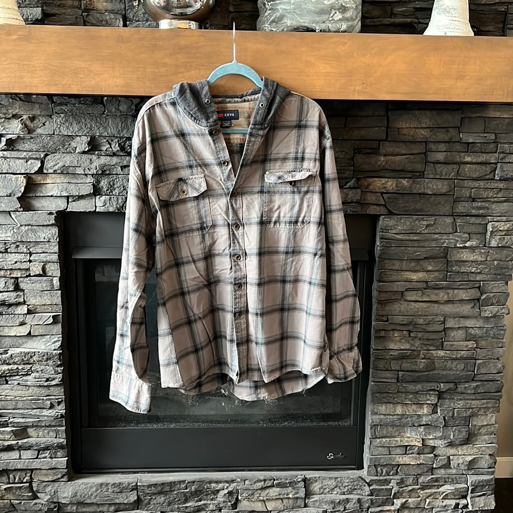 Plaid button down with a Hood. Perfect for the fall.
